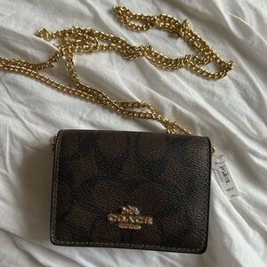 Coach Black and Brown Crossbody Bag with Gold Chain